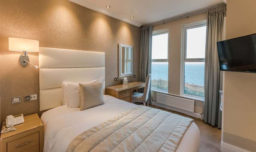 Carlyon Bay Hotel Single Sea Facing Room (208) Accommodation Bed and Desk