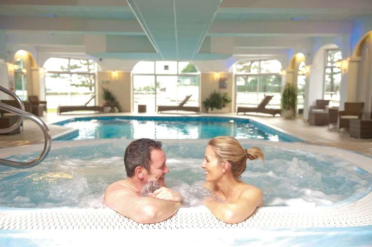 Carlyon Bay Hotel Couple Enjoying the Jacuzzi Spa Hot Tub