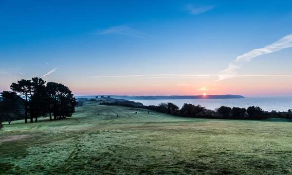 Sunrise at the first tee on the carlyon bay golf club