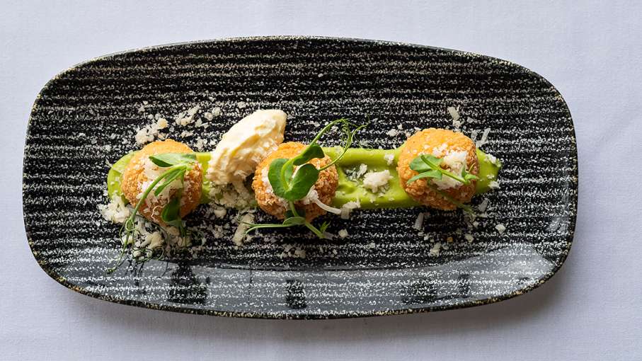  Ham Hock Arancini with Wild Garlic Pea Puree and Parmesan