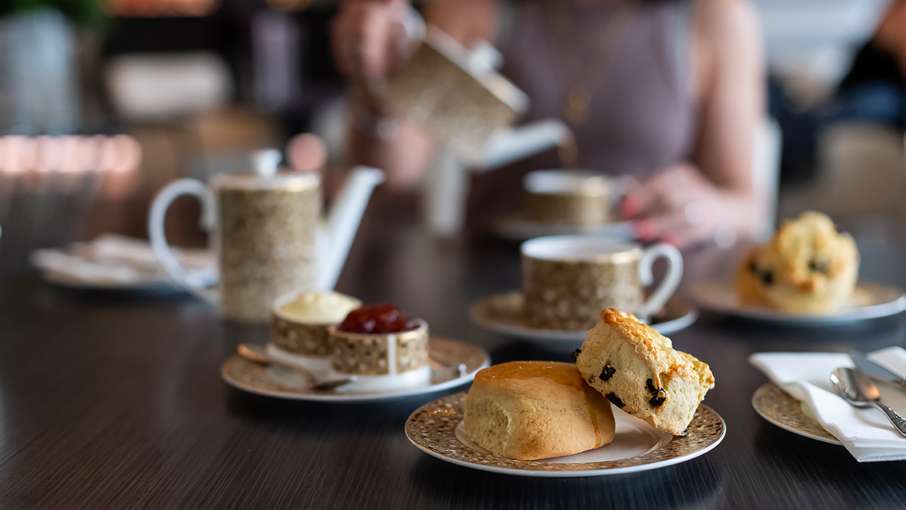 Cream tea with a pot of tea