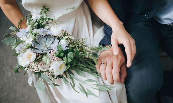 Bride and groom and beautiful bouquet