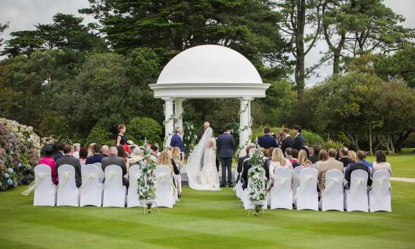 Wedding gazebo at Carlyon Bay Hotel with guests