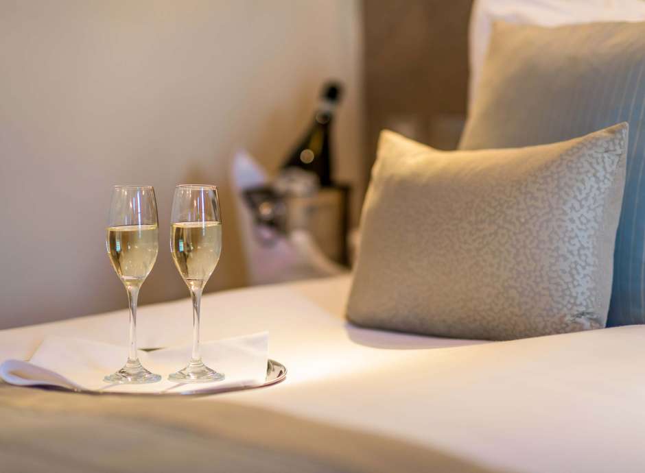 Carlyon Bay Hotel Champagne Flutes on Bed in Room