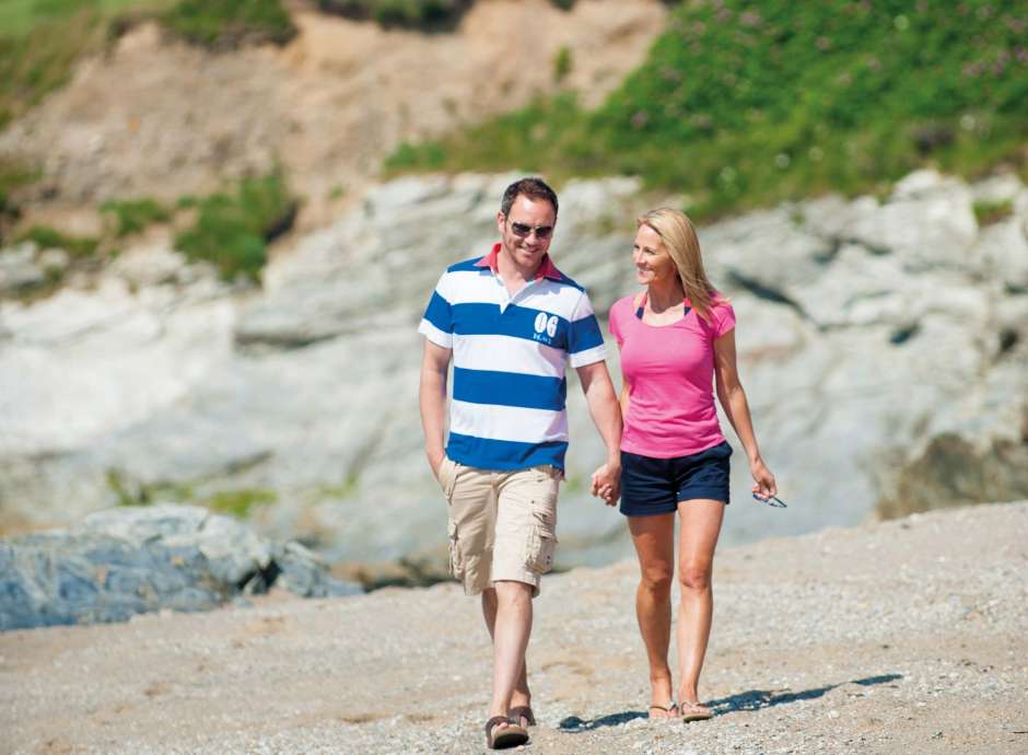 Carlyon Bay Hotel Couple Walking Along the Local Beach