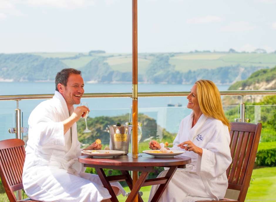 Carlyon Bay Hotel Couple Eating Breakfast and Enjoying the View from Their Balcony