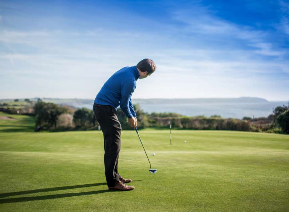 Carlyon Bay Hotel Golfer on Golf Course Overlooking Sea