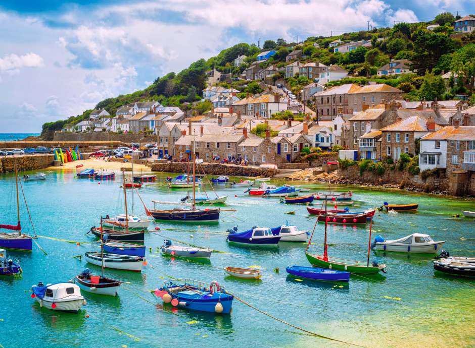 Boats in Mousehole Harbour Cornwall