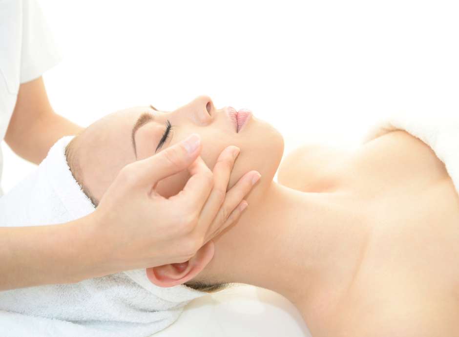 woman having spa treatment facial