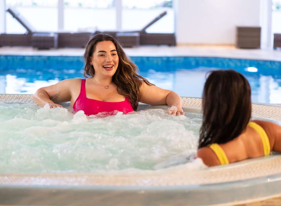 woman relaxing in spa bath