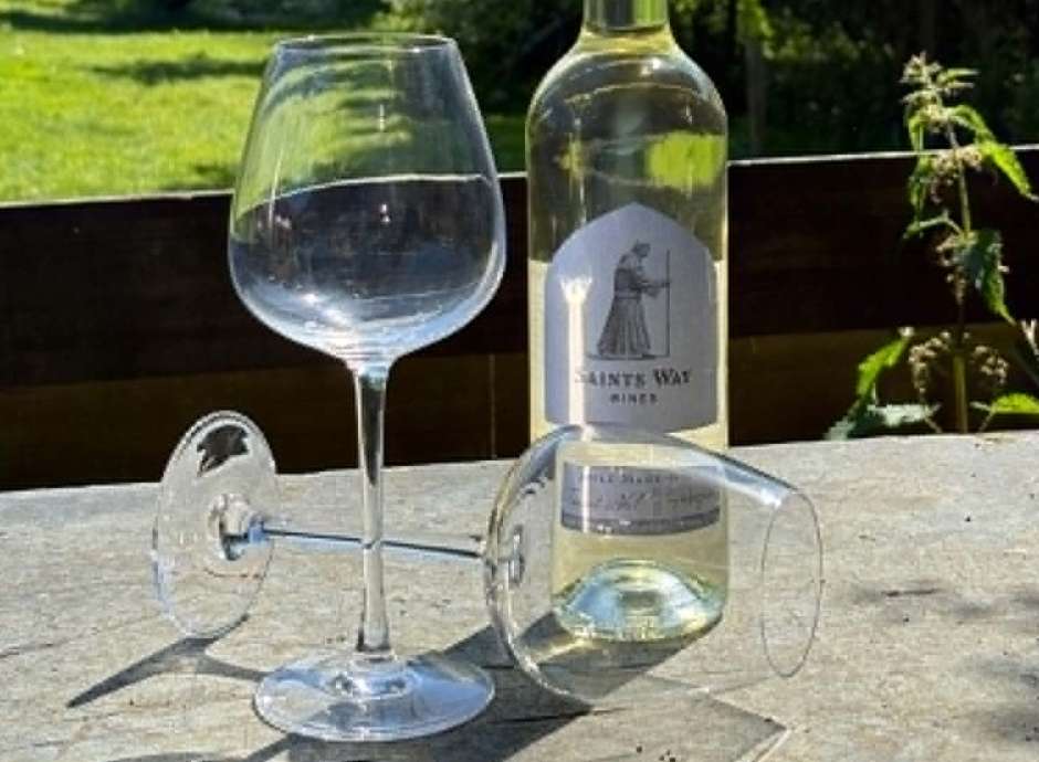 Two glasses and a botte of Saints Way Wines