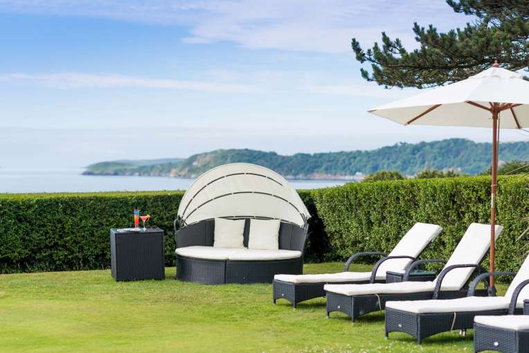 Carlyon Bay Hotel Covered Outdoor Seating and Sun Loungers