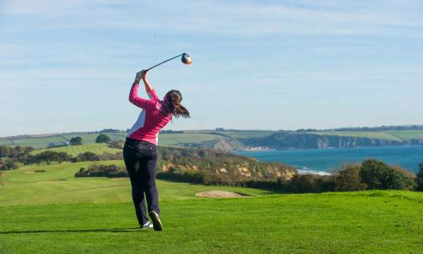 Carlyon Bay Hotel Golfer on Golf Course Overlooking Sea