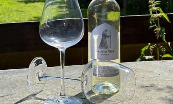 Two glasses and a botte of Saints Way Wines