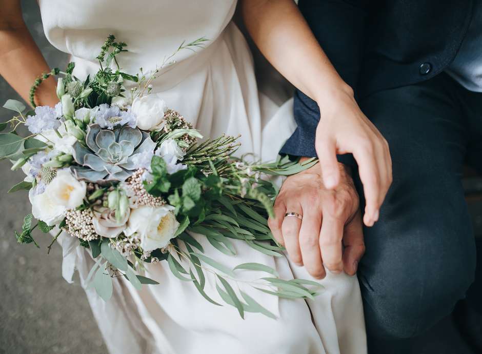 Bride and groom and beautiful bouquet